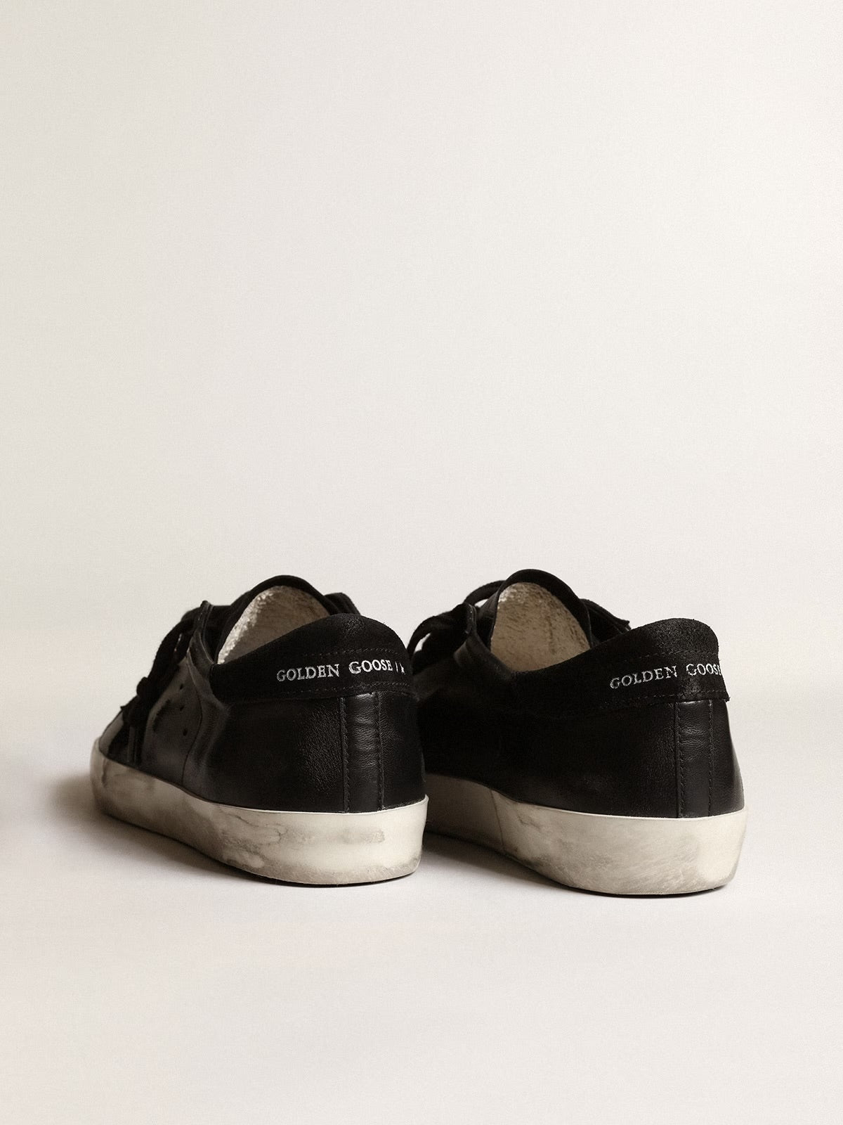 Super star nere con stella suede