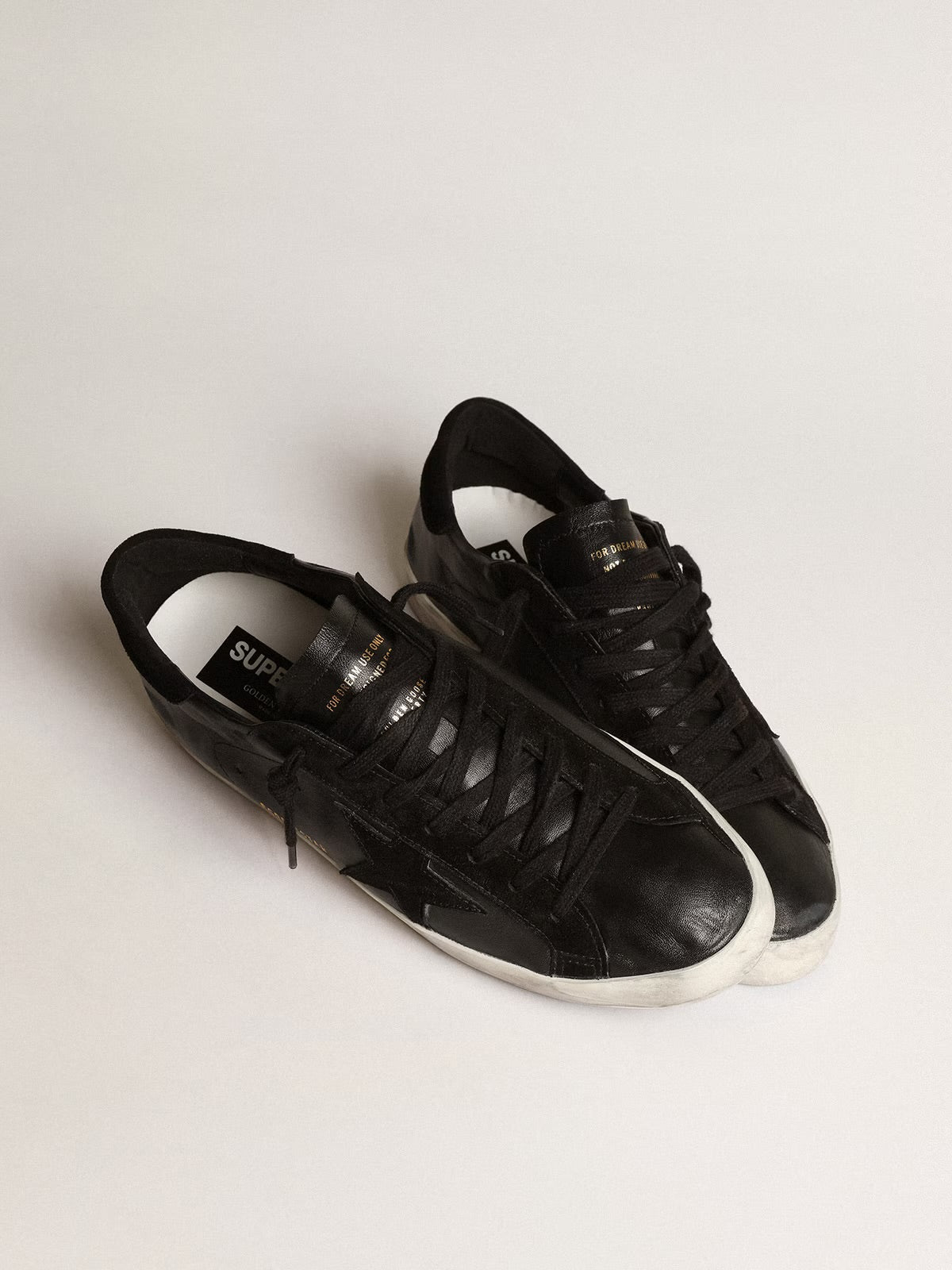 Super star nere con stella suede